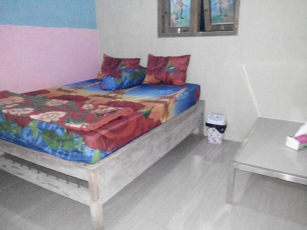 Yunior Guesthouse Tamansuruh Екстер'єр фото