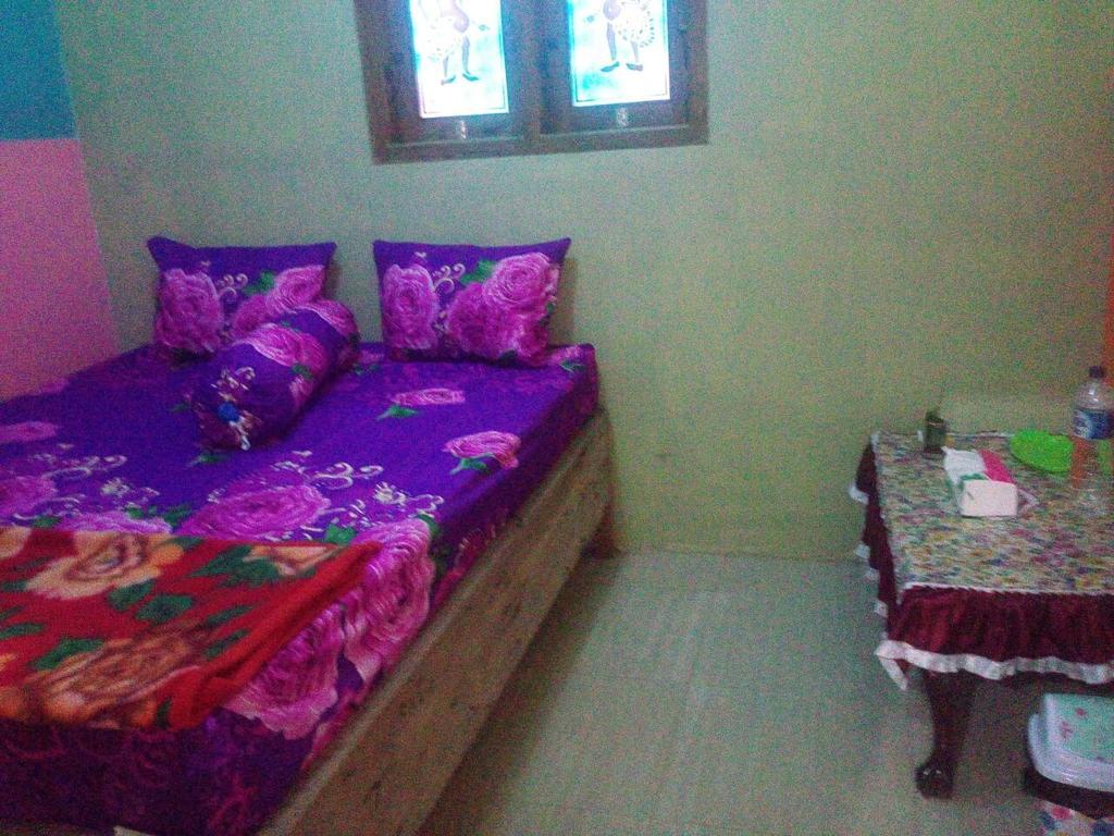 Yunior Guesthouse Tamansuruh Екстер'єр фото